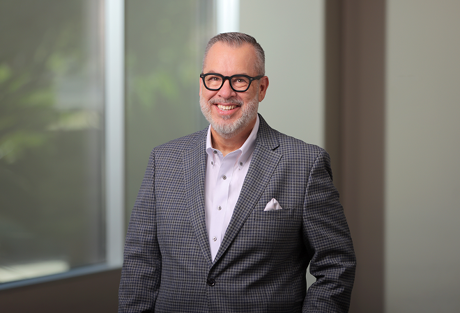 Professional image of Dr. Pickrel in a grey suit